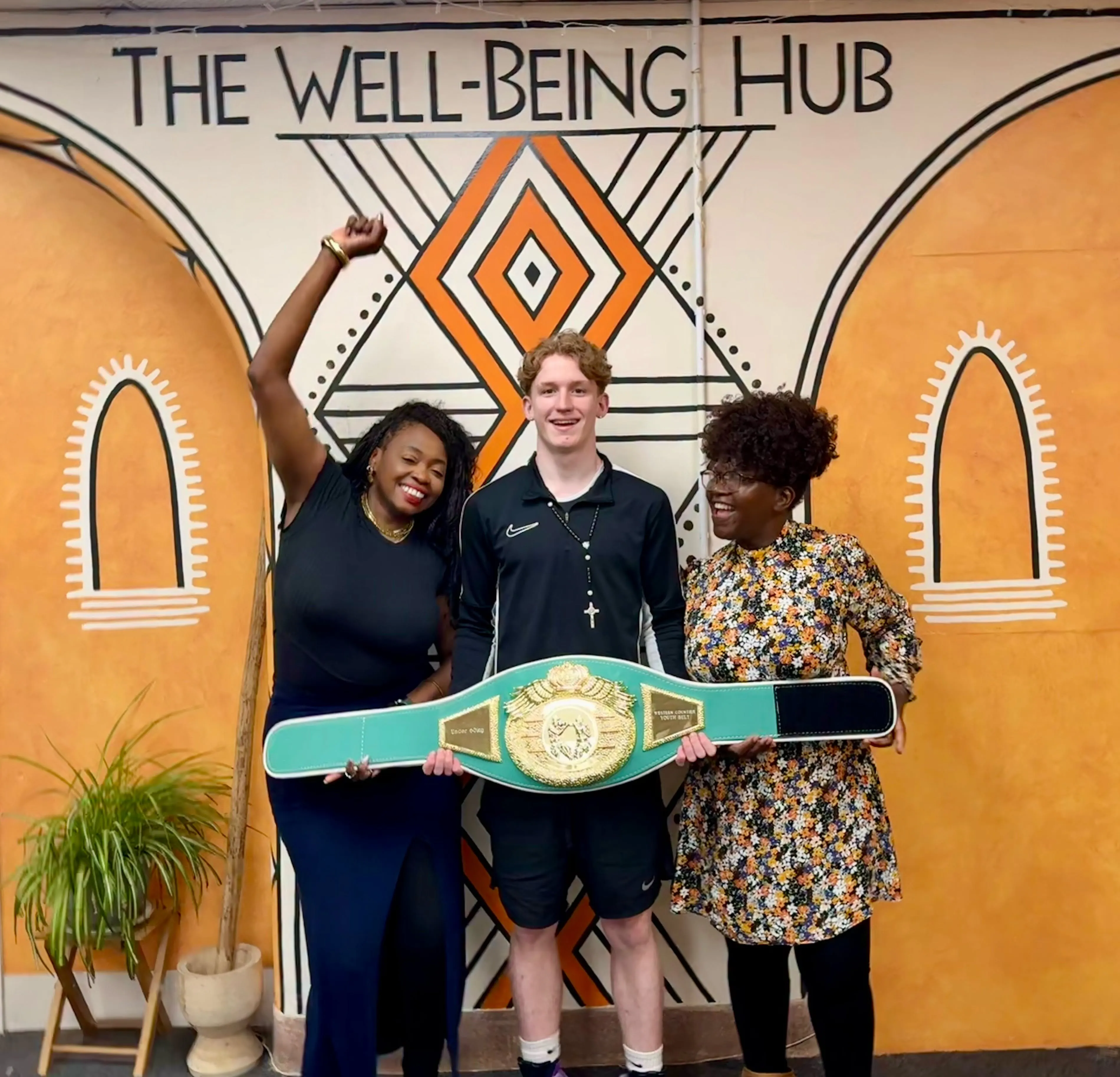 A boxing championship belt won by a member of the Hub community