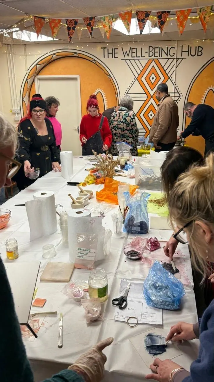 A craft workshop around a long table at The Wellbeing Hub