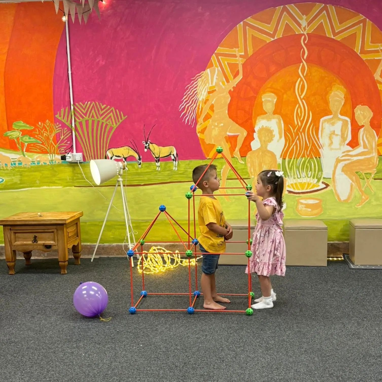 Children playing in the Hub family space