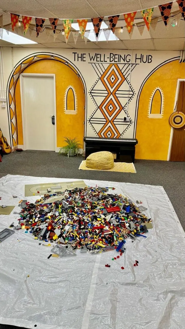 Children building at the LEGO club at The Wellbeing Hub